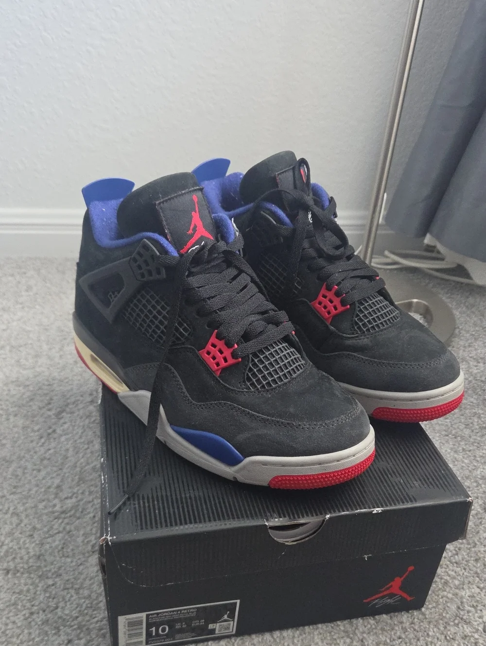 Jordan Men's Black Suede Sneakers with Red and Blue Accents